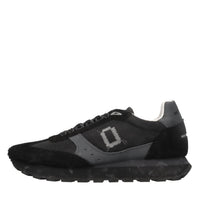 Sneakers in pelle e tessuto 
