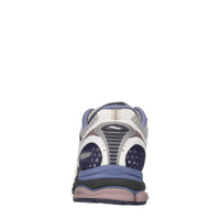 Sneakers in pelle e tessuto 