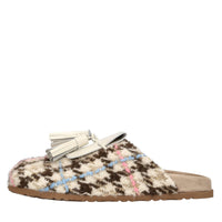 Mules in tessuto e pelle 