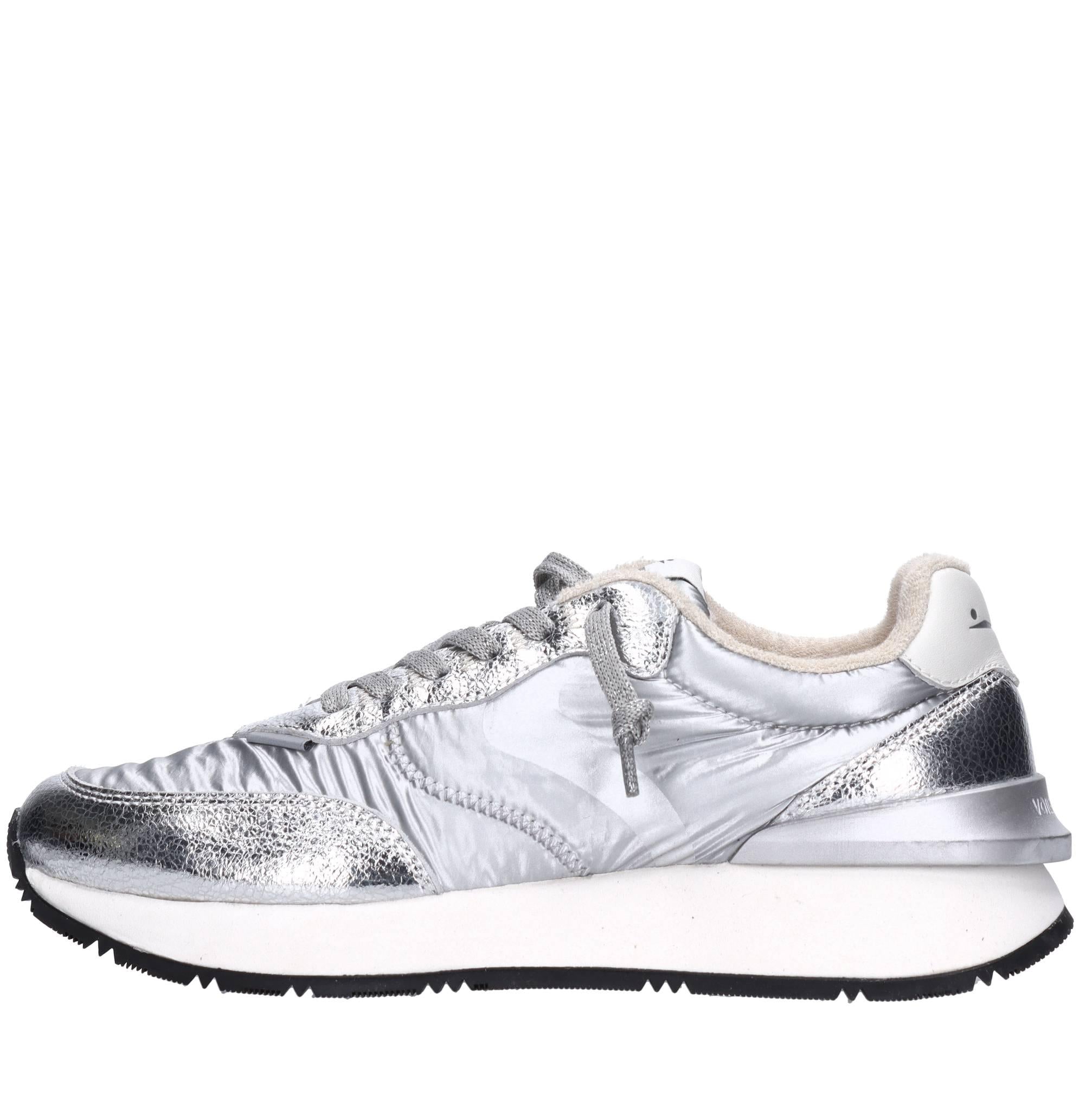 Sneakers in pelle e tessuto 