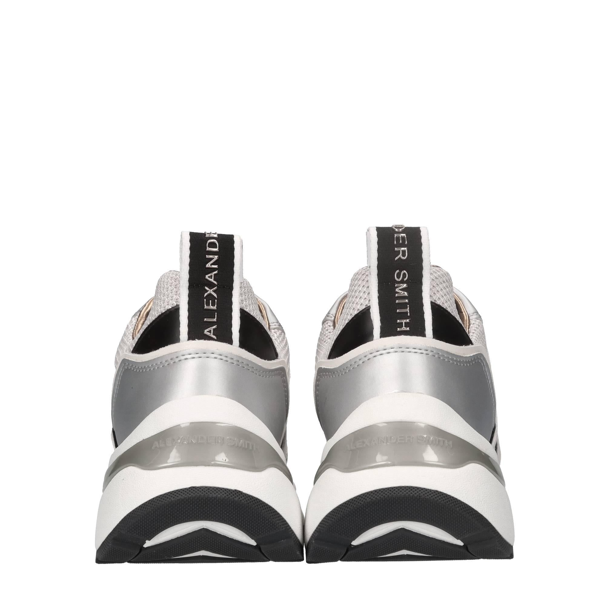 Sneakers in pelle, ecopelle e tessuto 