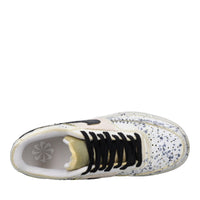 Sneakers in ecopelle e tessuto 