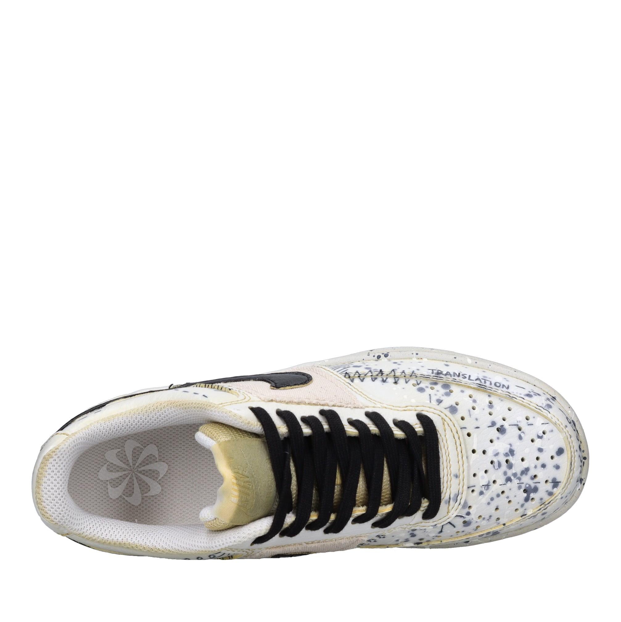 Sneakers in ecopelle e tessuto 
