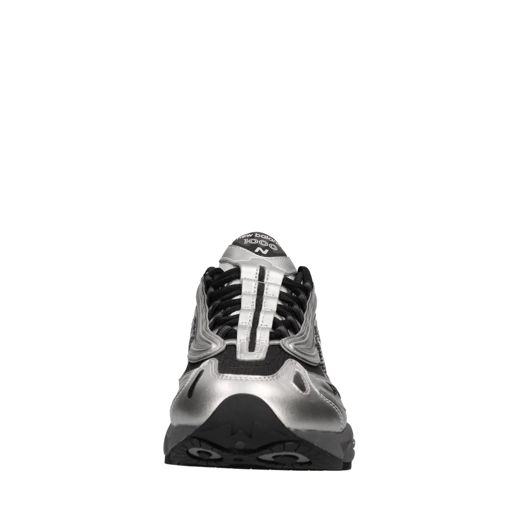 Sneakers in ecopelle e tessuto 