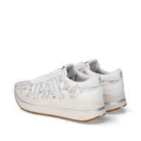 Sneakers in pelle e tessuto 