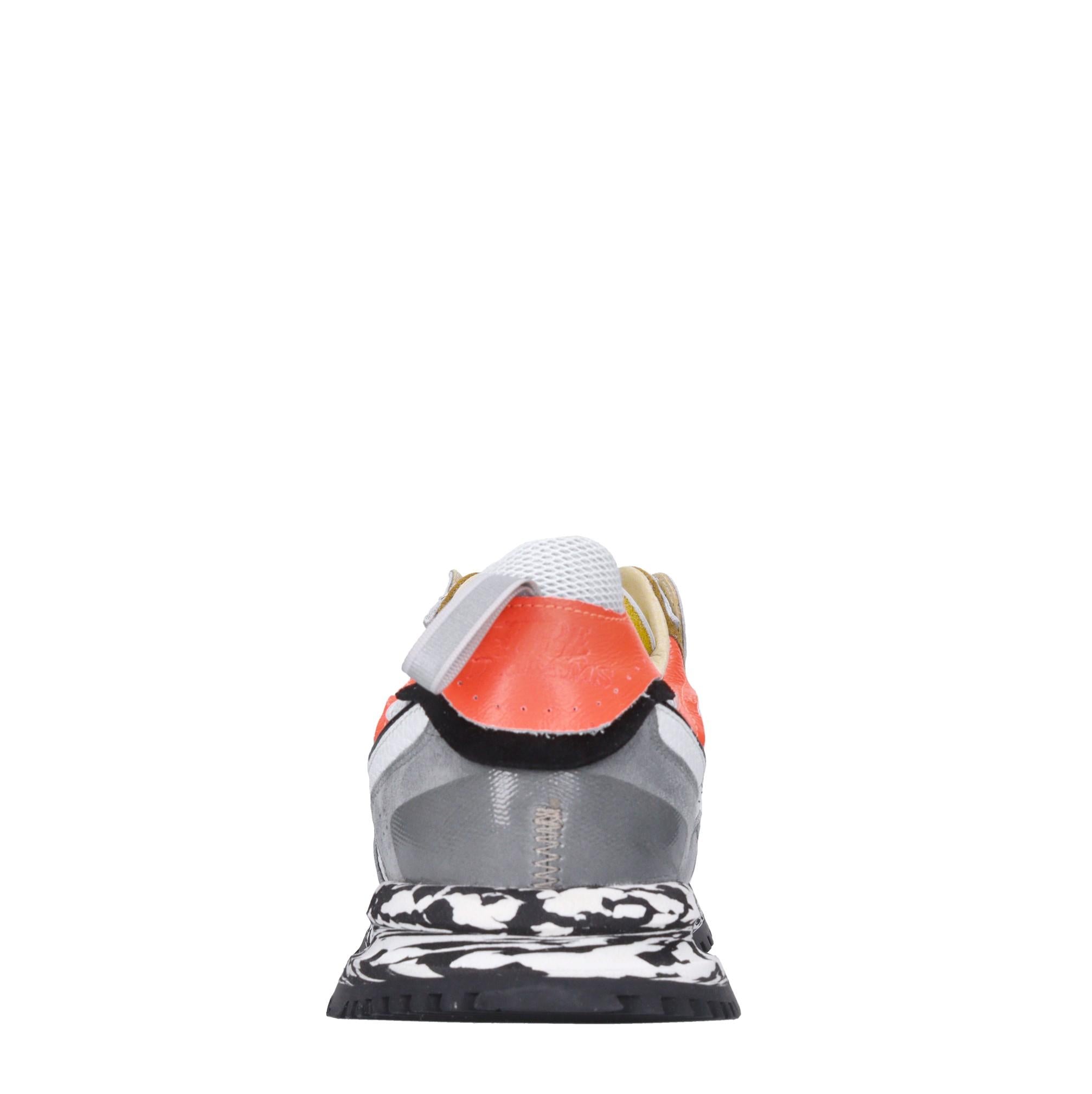 Sneakers in pelle e tessuto 