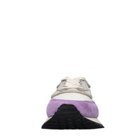 Sneakers in pelle e tessuto 