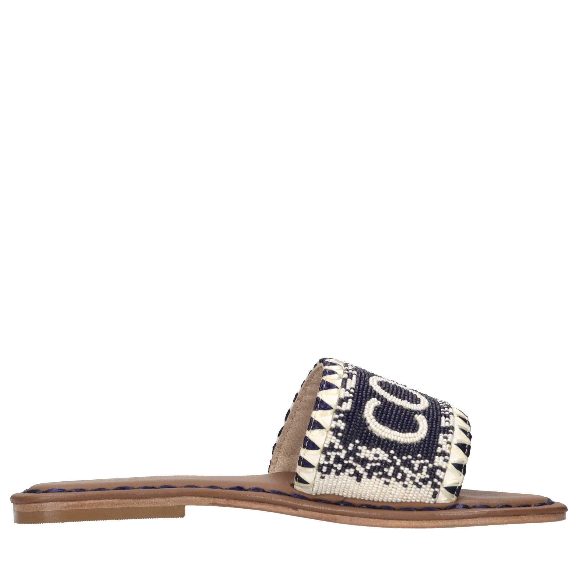 Mules in pelle,perline e rafia 