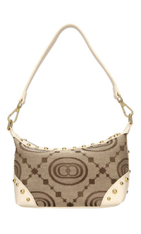 Borsa in tessuto con inserti in pelle e borchie 