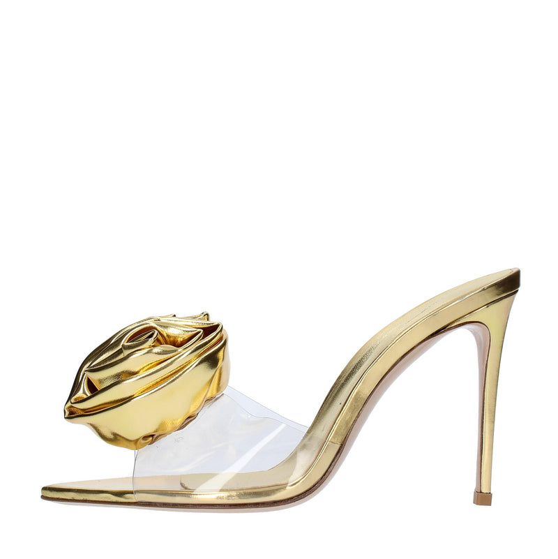 Mules in pelle e PVC 