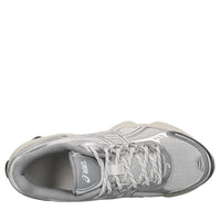 Sneakers in ecopelle e tessuto 