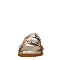 Mules in pelle con borchie 