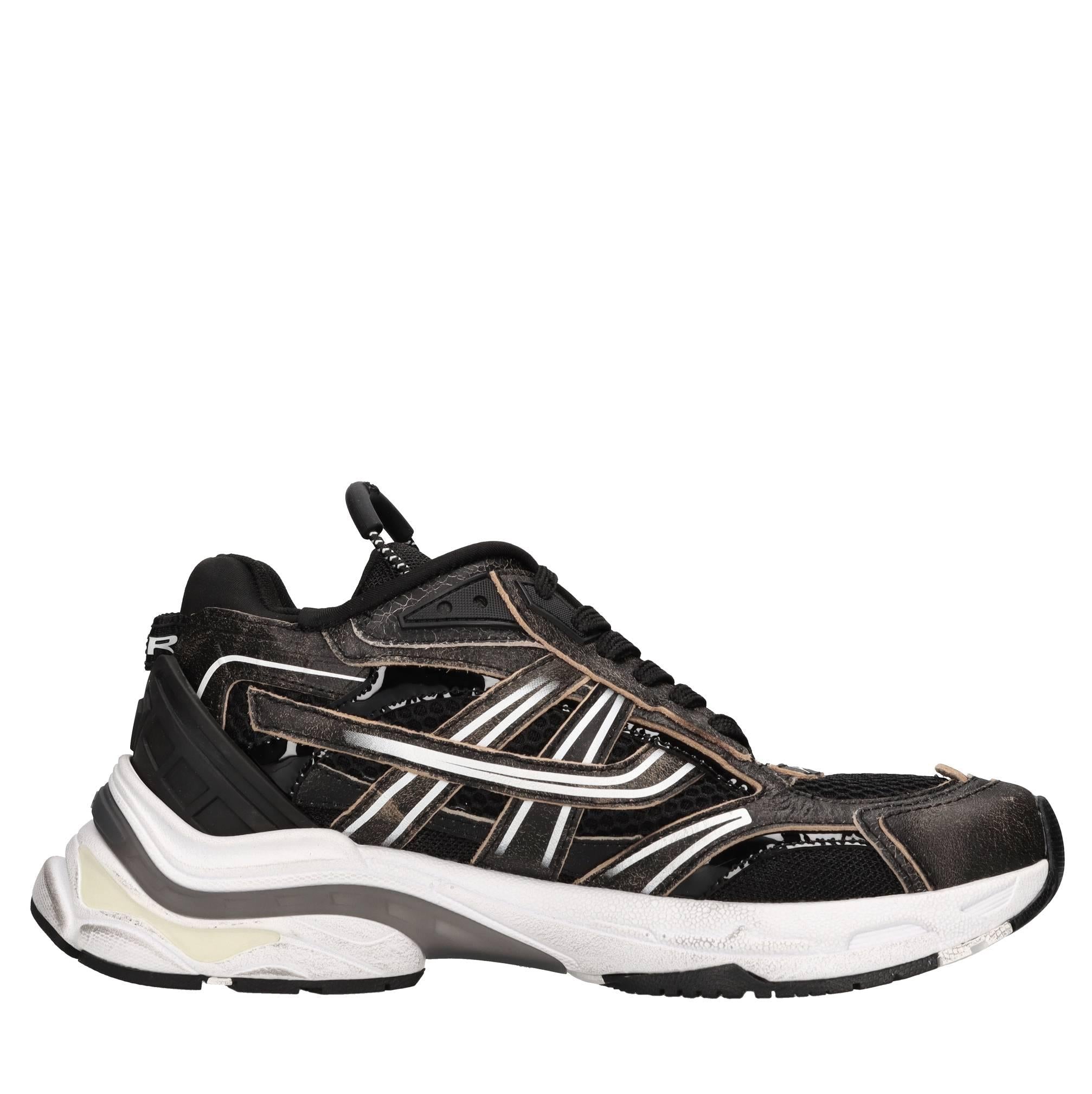 Sneakers in pelle e tessuto 