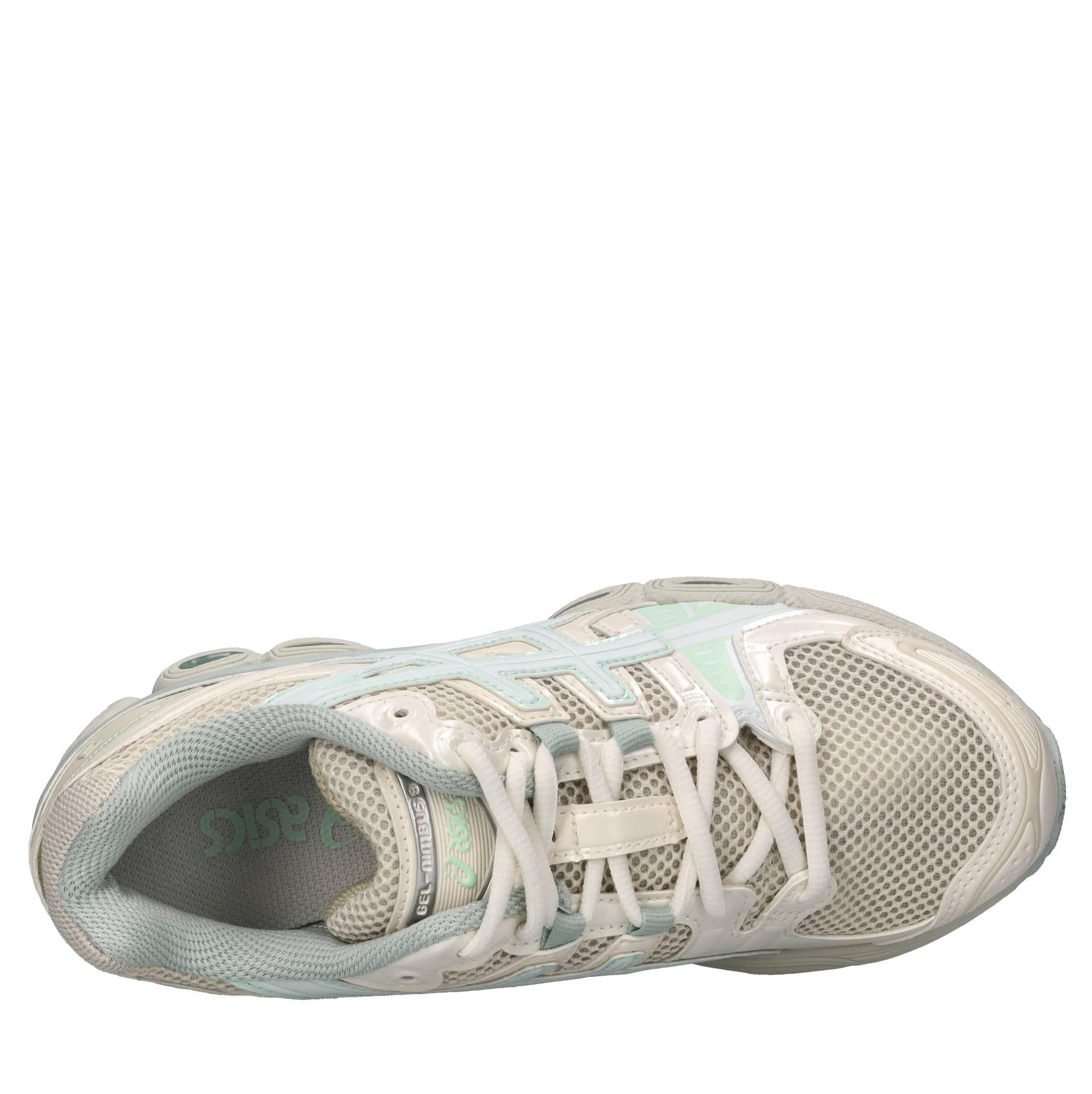 Sneakers in ecopelle e tessuto 