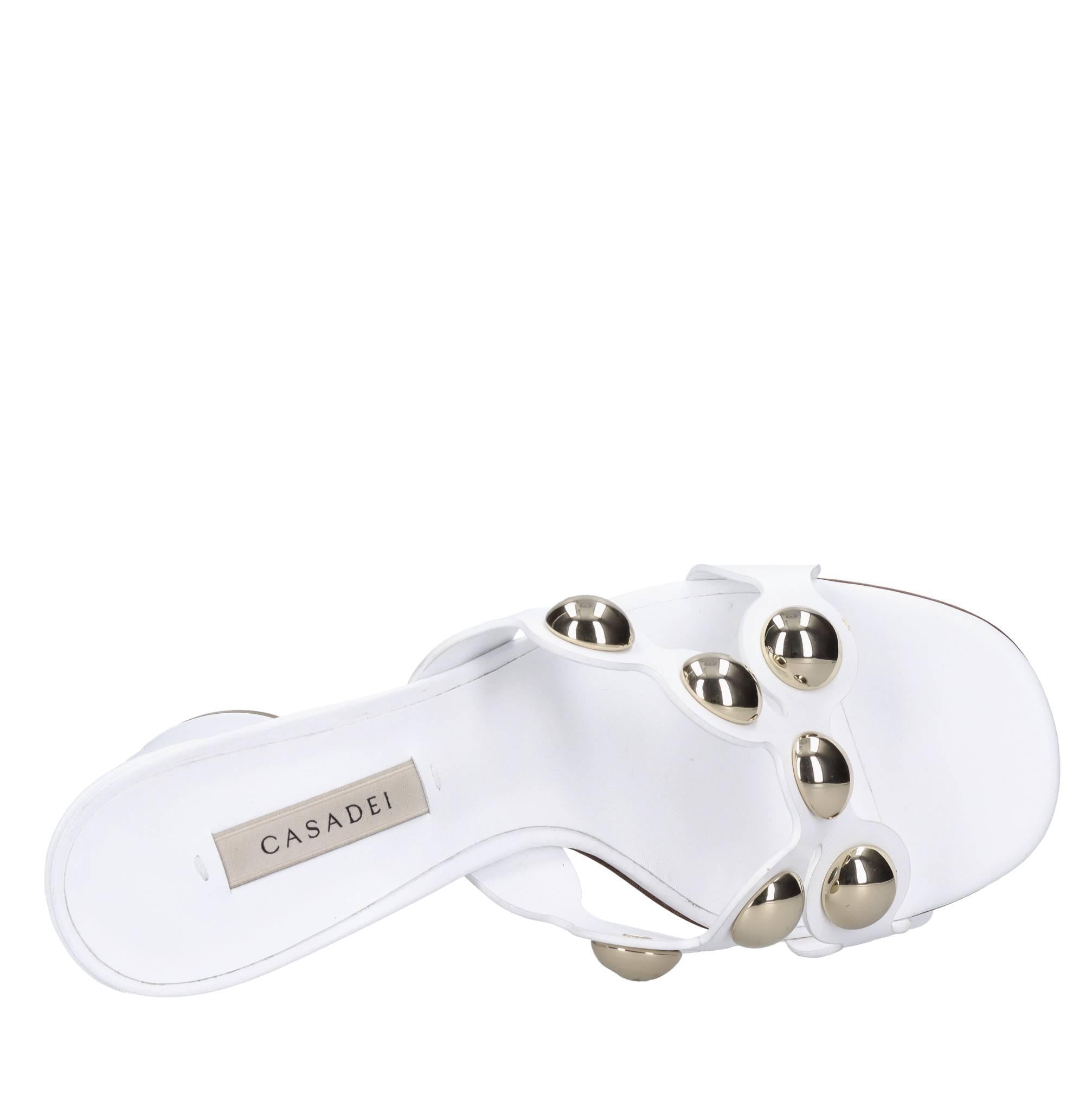 Mules in pelle e borchie 
