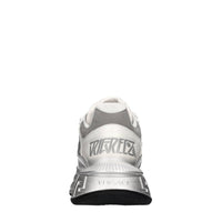Sneakers in pelle e tessuto 
