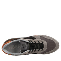 Sneakers in camoscio e tessuto 