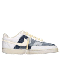Sneakers in ecopelle e tessuto 