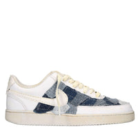 Sneakers in ecopelle e tessuto 