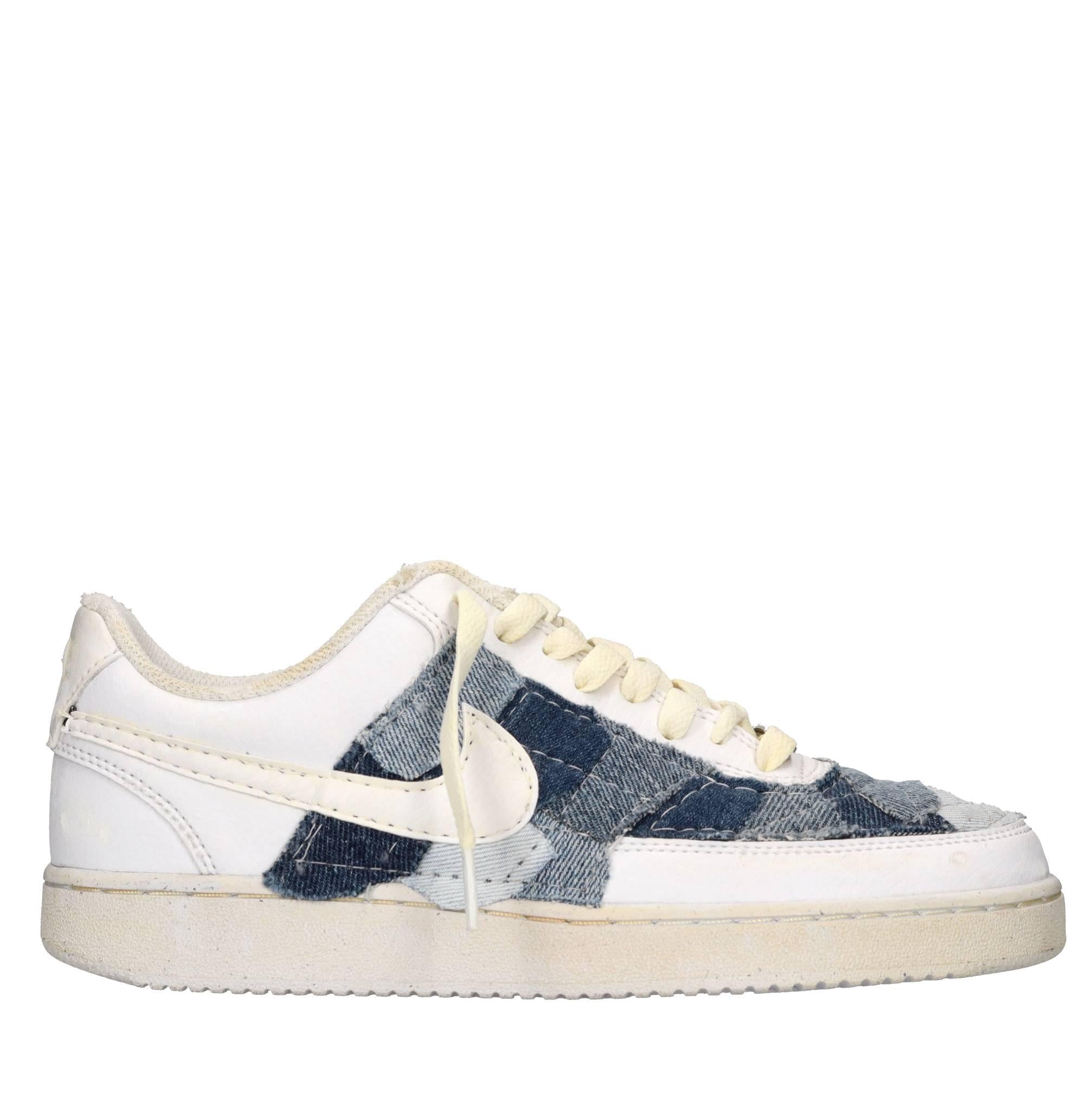 Sneakers in ecopelle e tessuto 