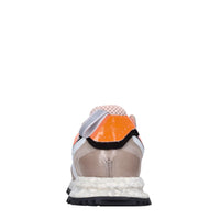 Sneakers in pelle e tessuto 