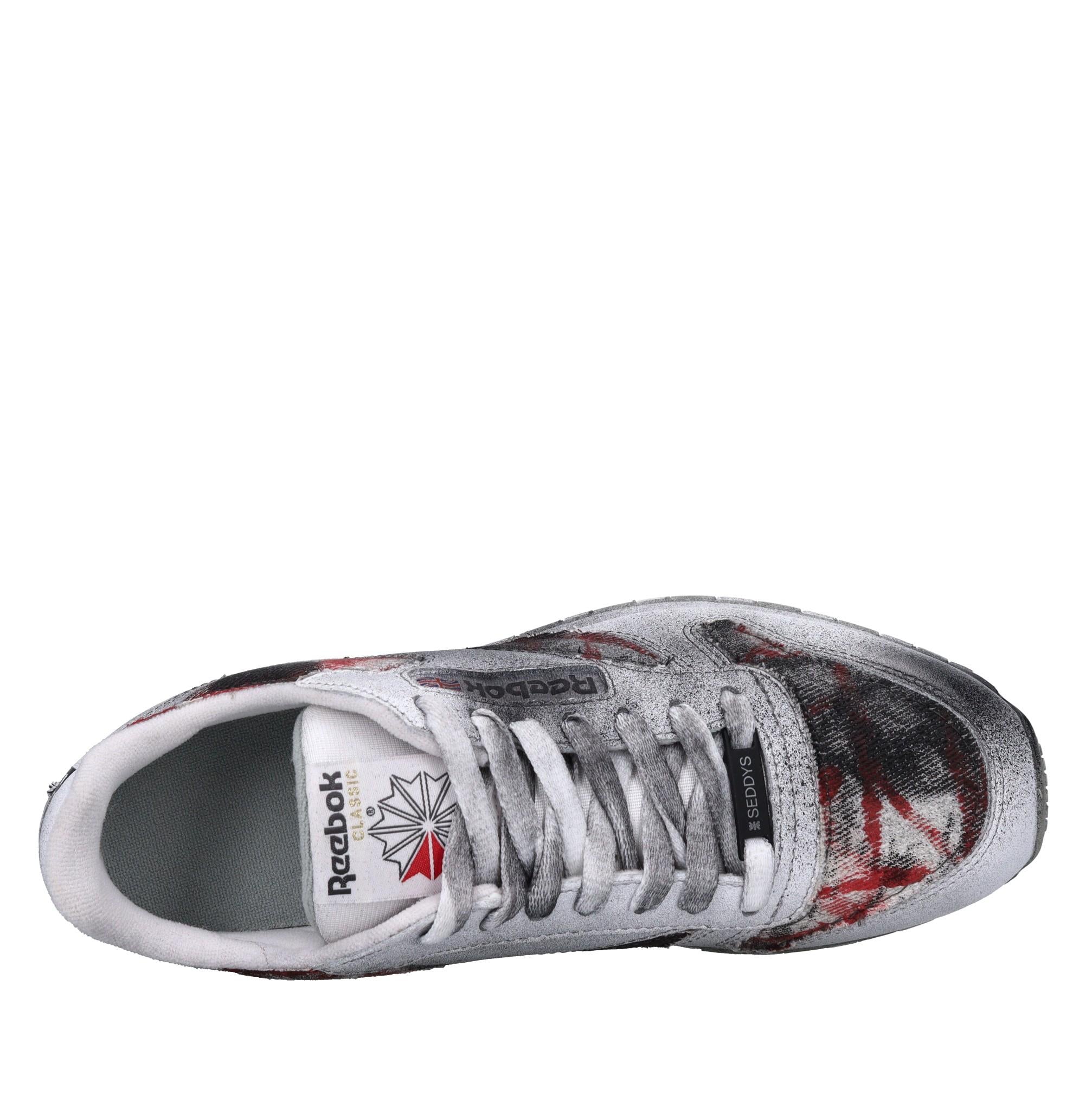 Sneakers in pelle e tessuto 