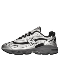 Sneakers in ecopelle e tessuto 
