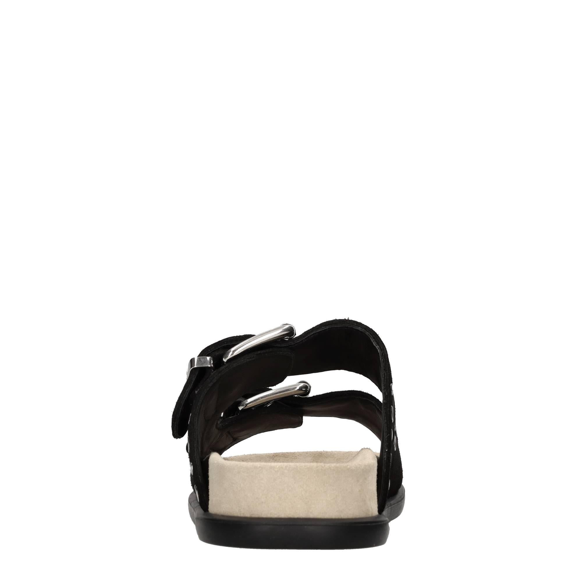 Mules in camoscio e borchie 