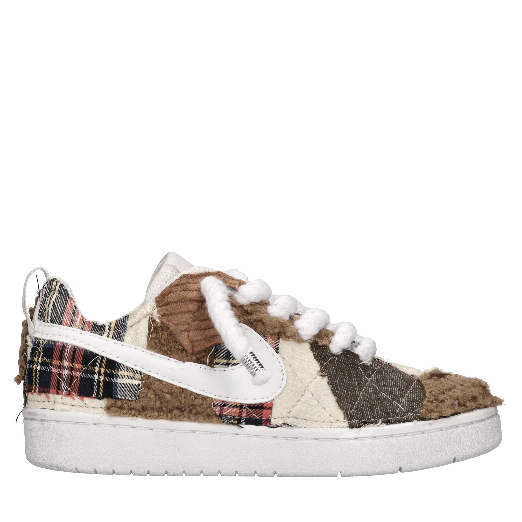 Sneakers in ecopelle e tessuto 