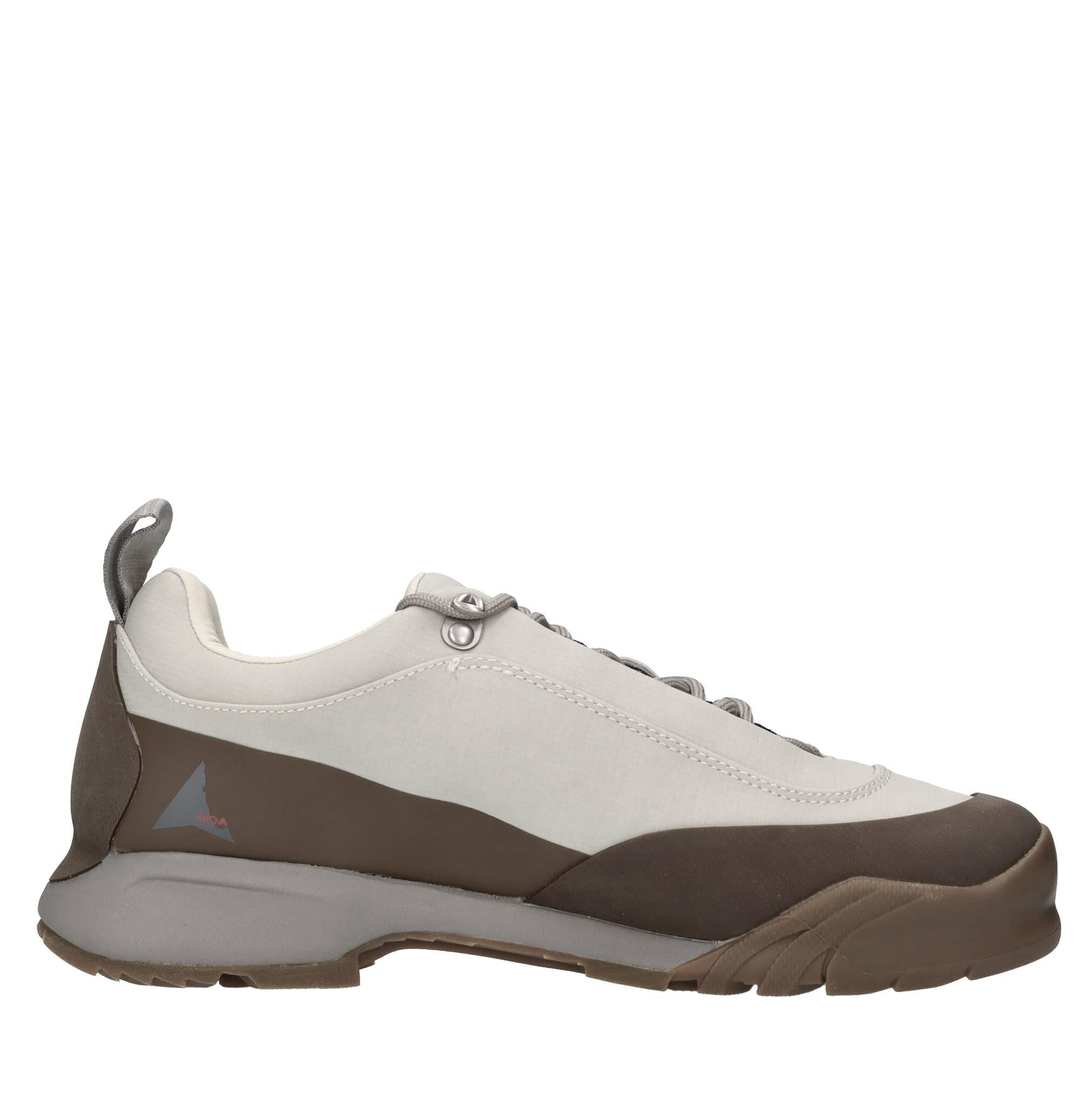 Sneakers in ecopelle e tessuto 