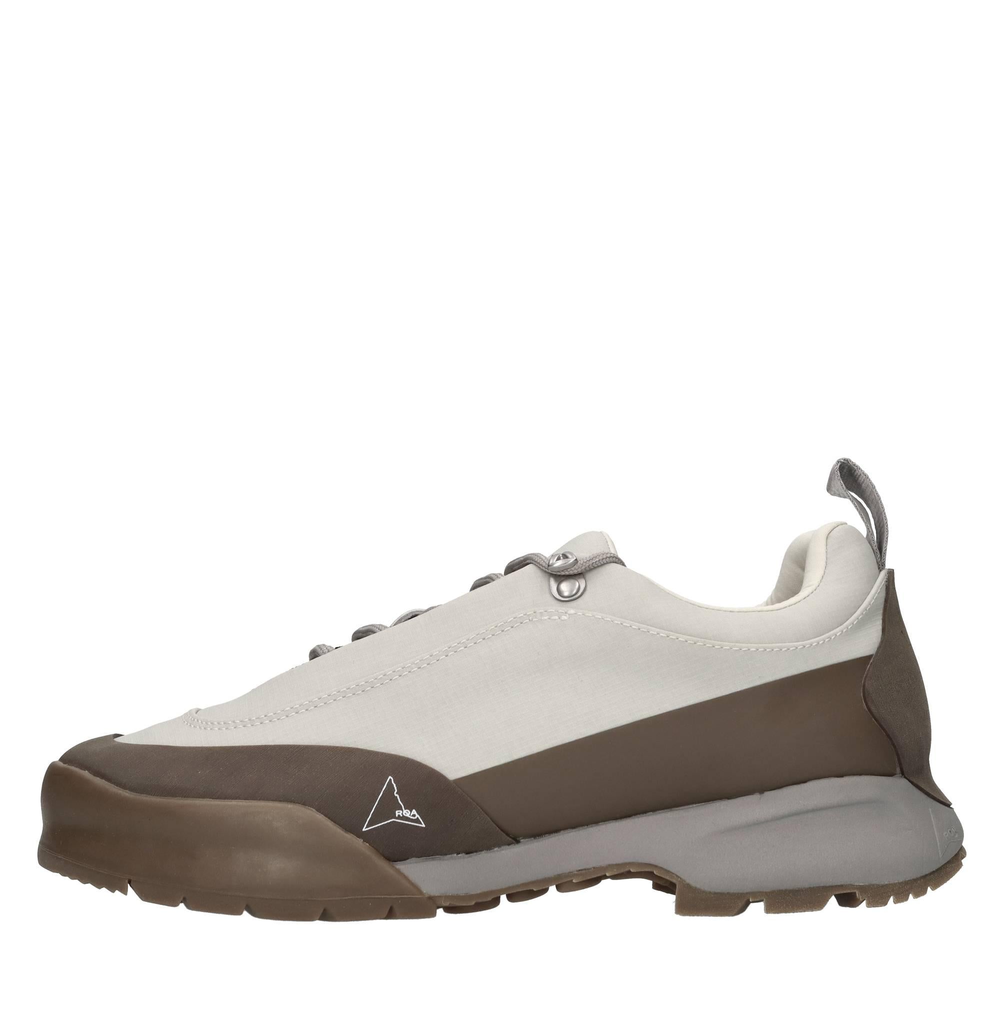 Sneakers in ecopelle e tessuto 
