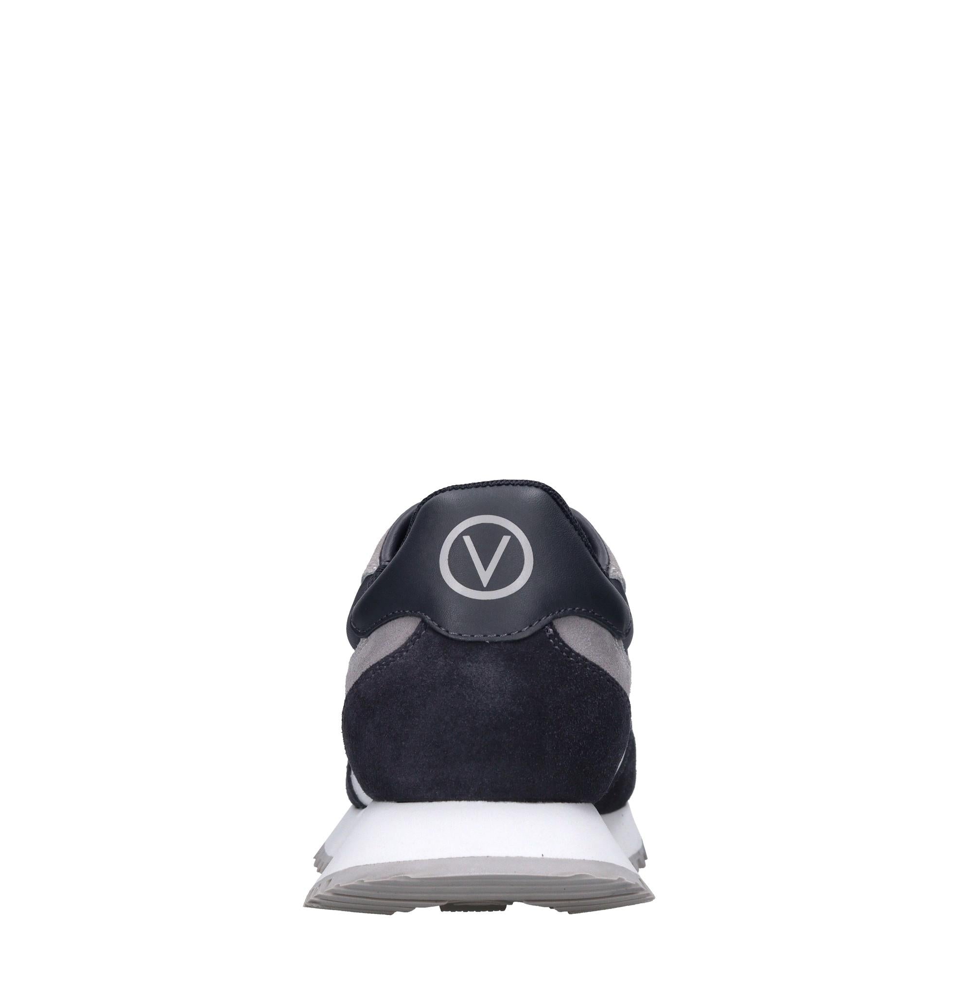 Sneakers in pelle e tessuto 