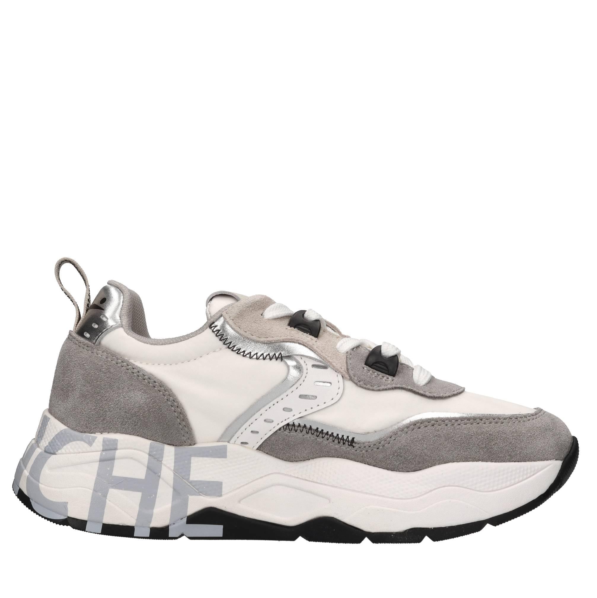 Sneakers in pelle e tessuto 