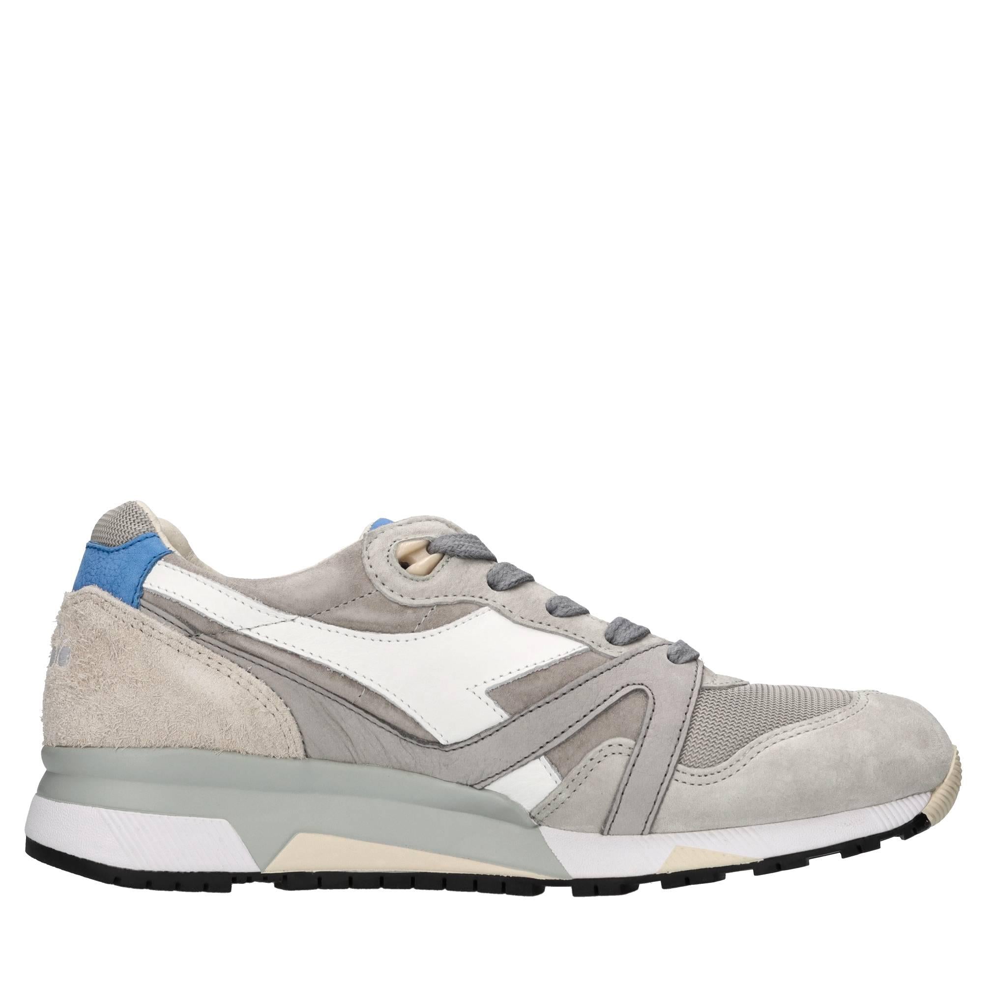 Sneakers in pelle,camoscio e tessuto 
