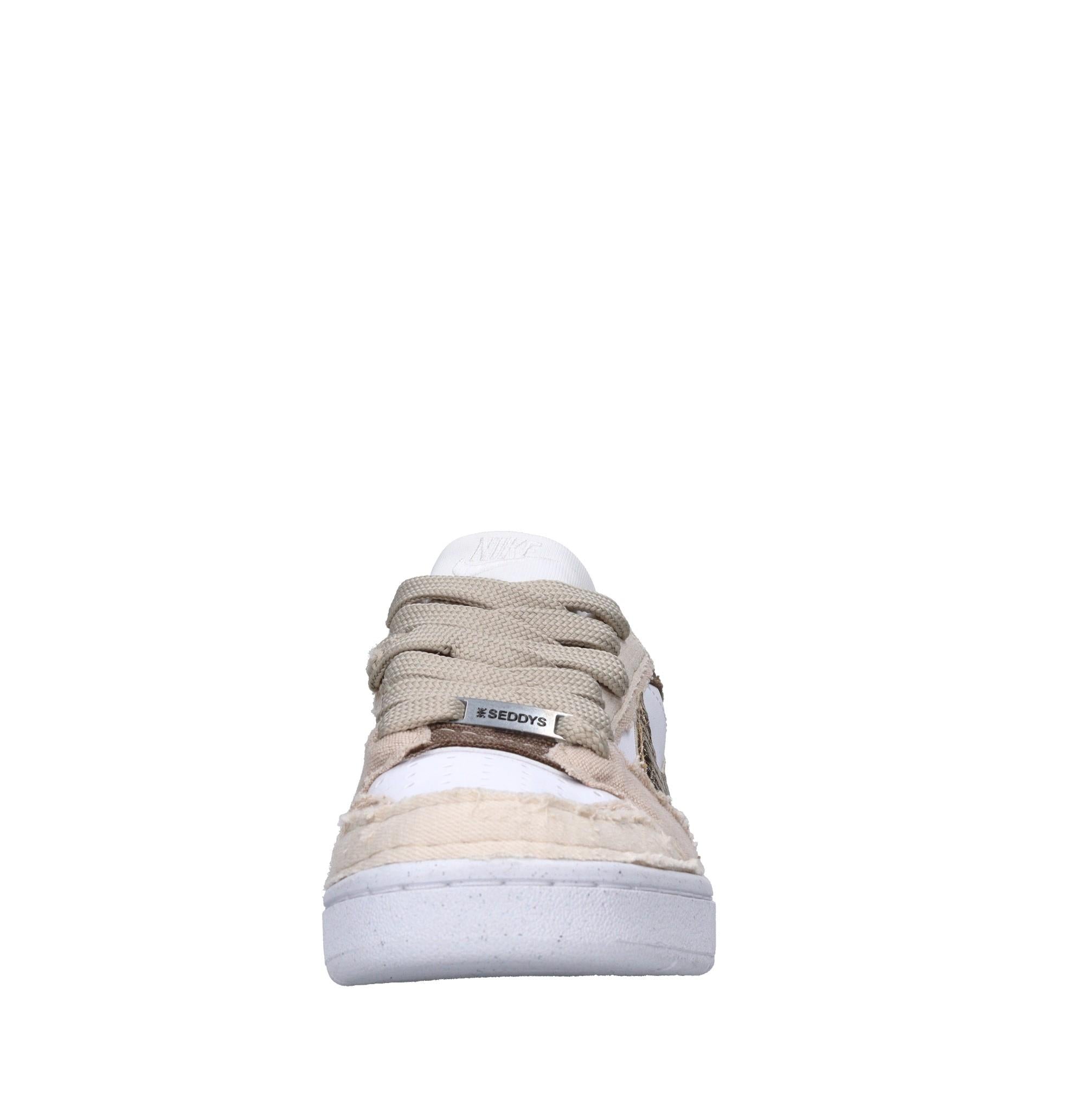 Sneakers in ecopelle e tessuto 