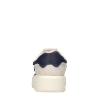 Sneakers in pelle e tessuto 