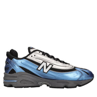 Sneakers in ecopelle e tessuto 