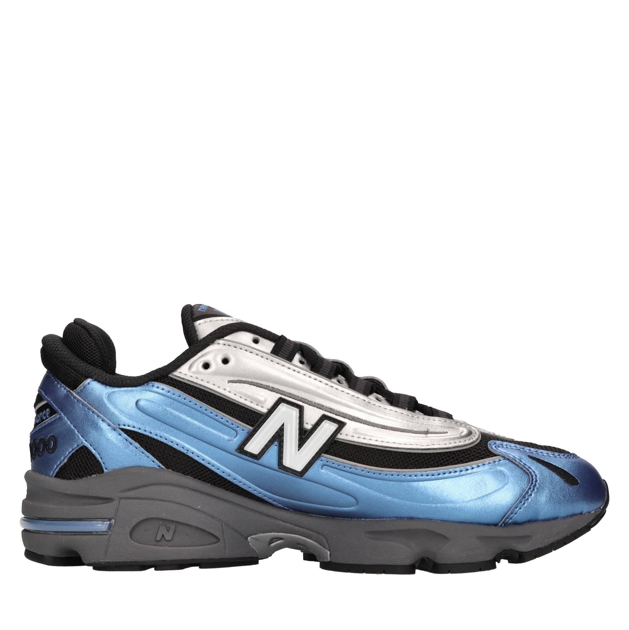 Sneakers in ecopelle e tessuto 
