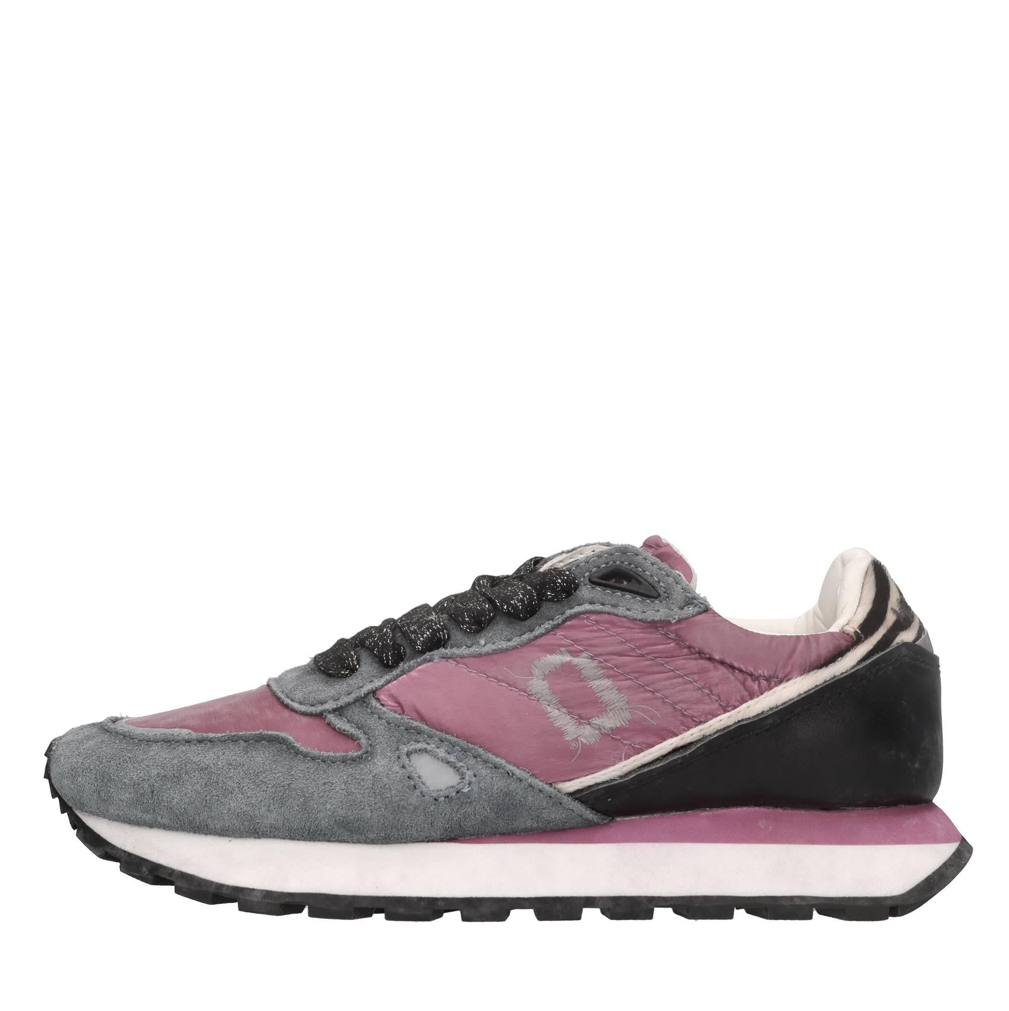 Sneakers in pelle e tessuto 