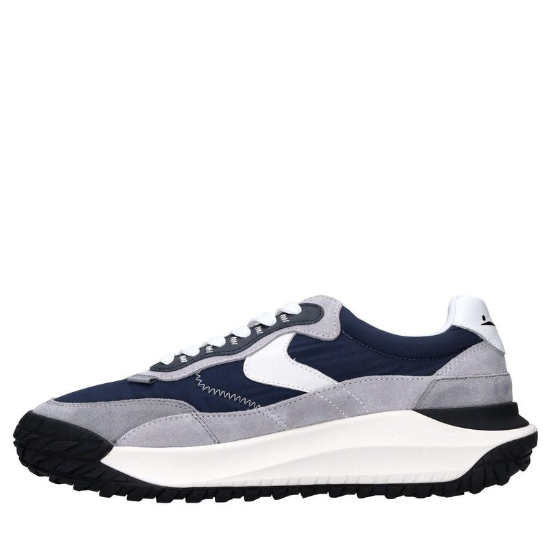 Sneakers in pelle e tessuto 