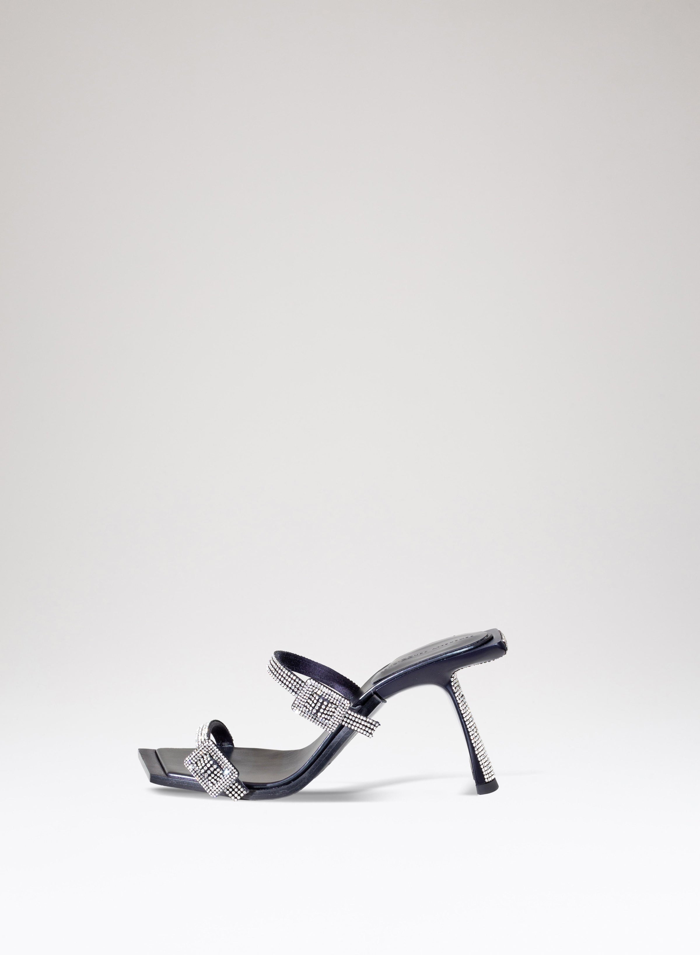 Mules Ewa in pelle tessuto e strass 
