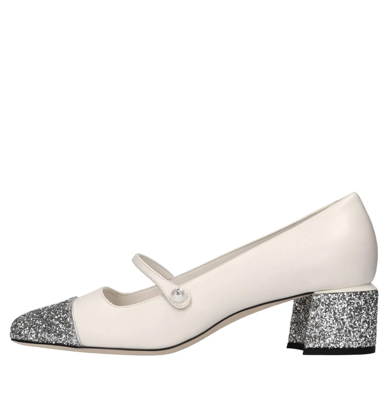 Décolleté in pelle e glitter 