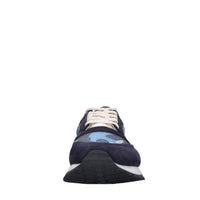 Sneakers in pelle e tessuto 