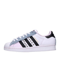 Sneakers in pelle e tessuto 