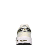 Sneakers in ecopelle e tessuto 