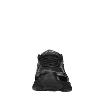 Sneakers in ecopelle e tessuto 