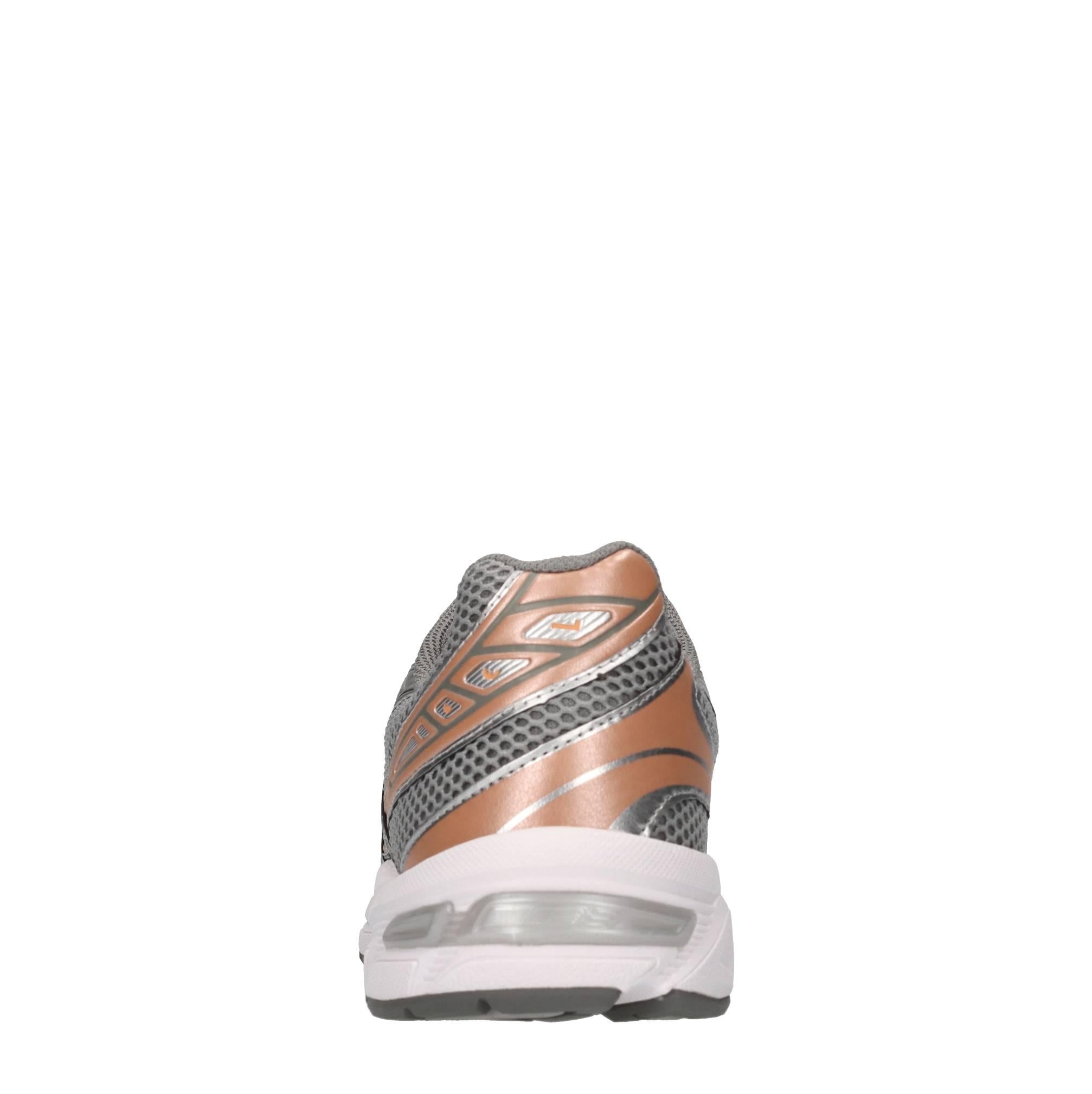 Sneakers in ecopelle e tessuto 