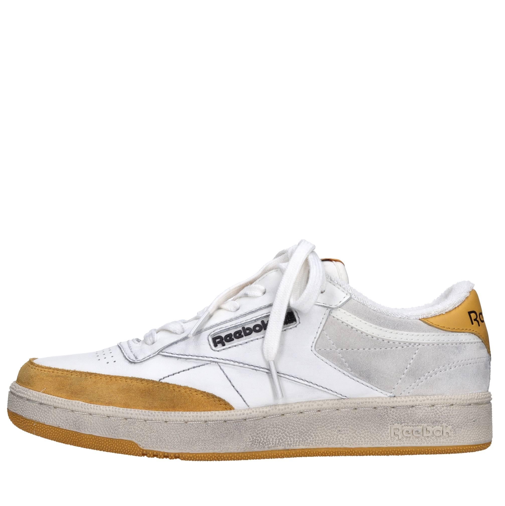 Sneakers in pelle camoscio e tessuto 