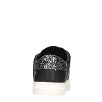 Sneakers in pelle e tessuto 