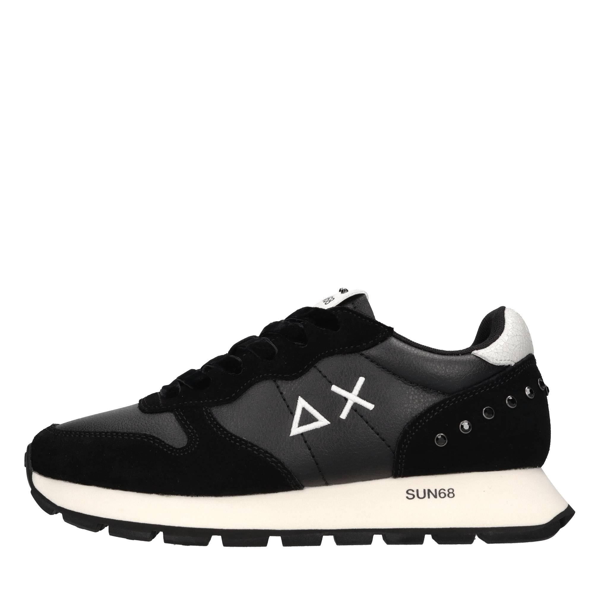 Sneakers in pelle, tessuto ed ecopelle 